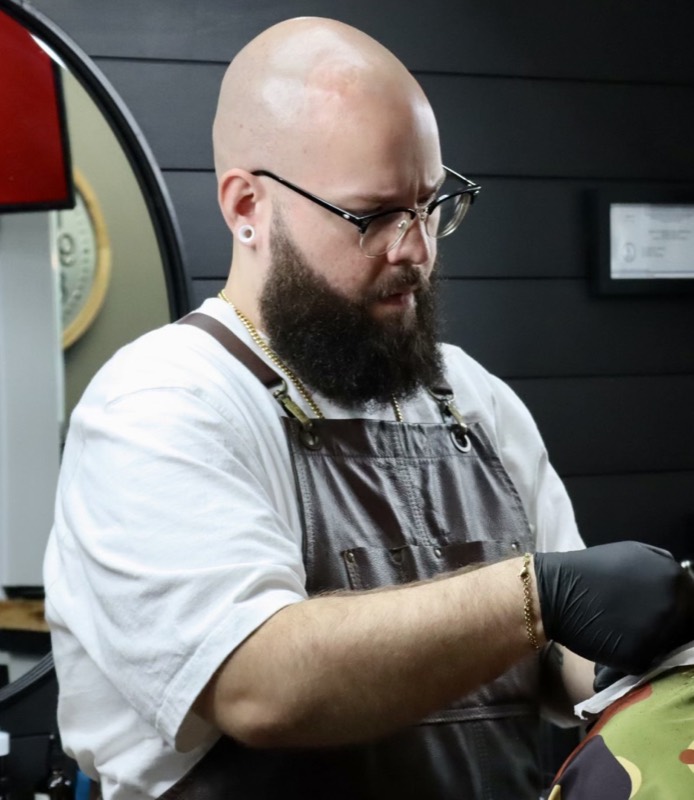 Kyle, barber at Paulie's Barber Shop